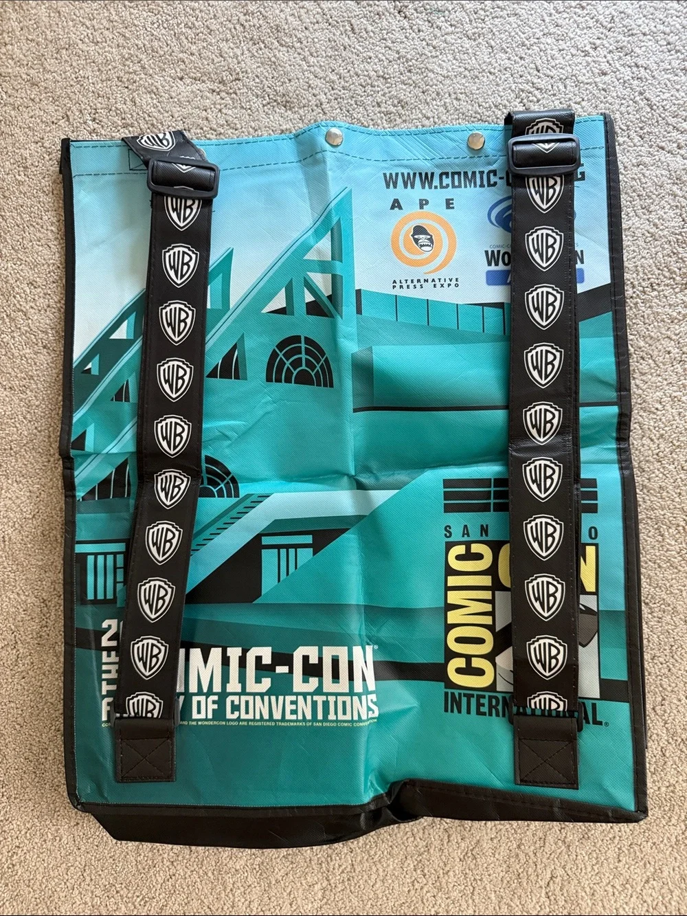 2014 Warner Bros. Teal Comic-Con Graphic Duffel Bag with Black Logo Straps